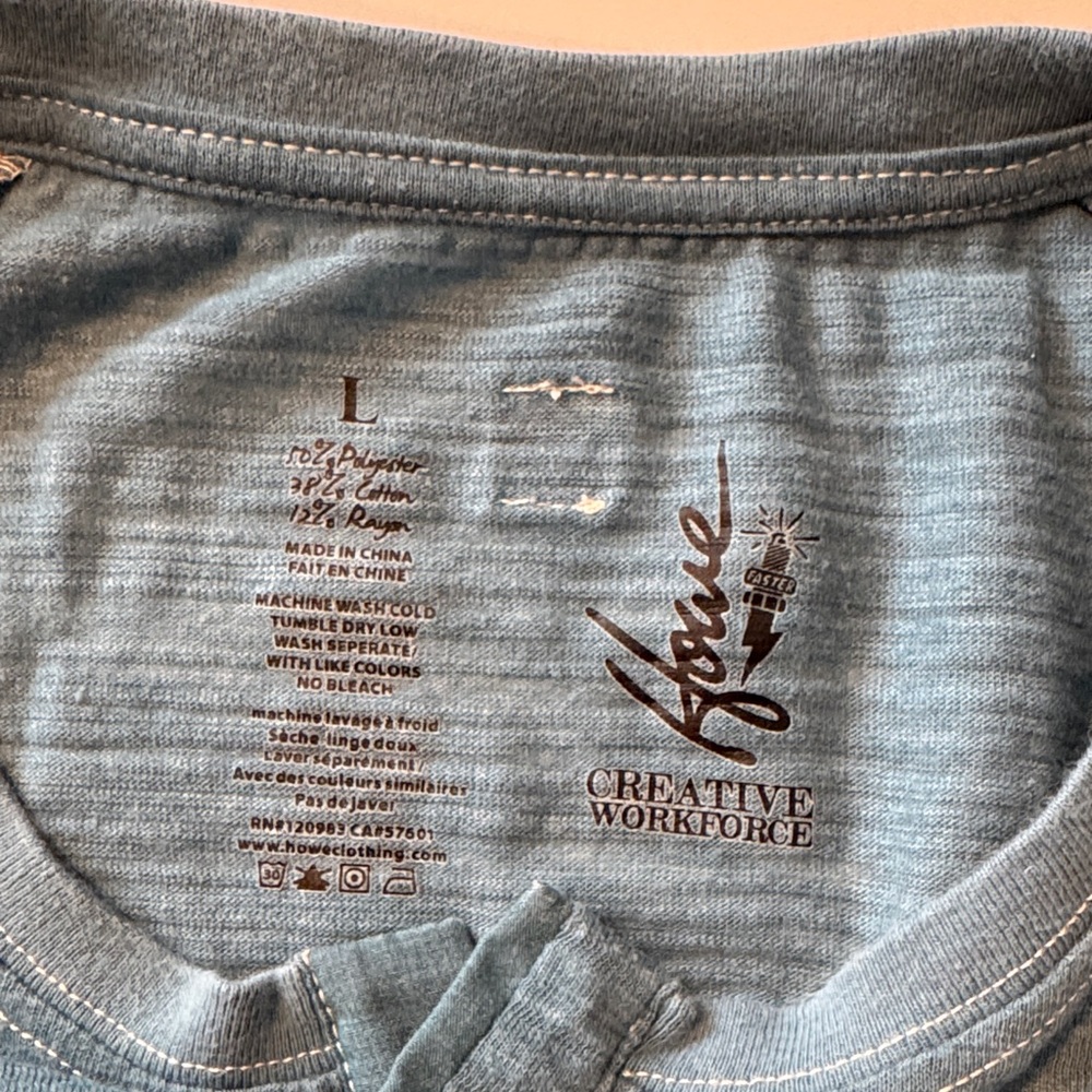 Blue 5 button Henley Shirt with 3/4 sleeves by Howe surf brand